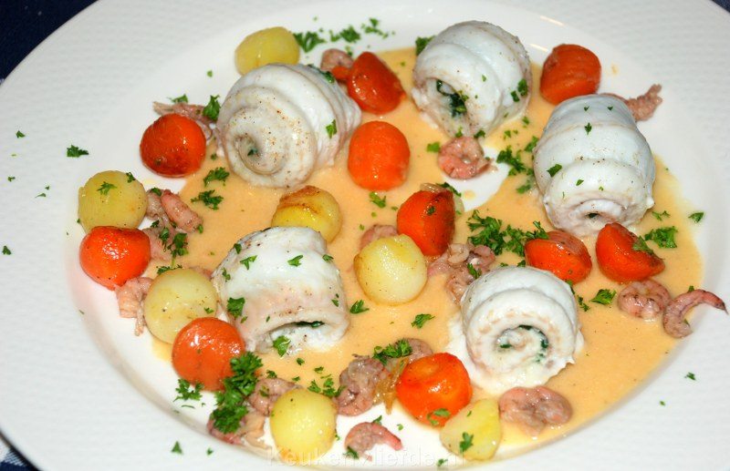 Tongrolletjes met spinazie en champagnesaus