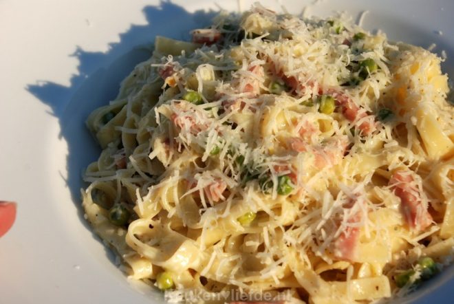 Tagliatelle met doperwten en ham-roomsaus