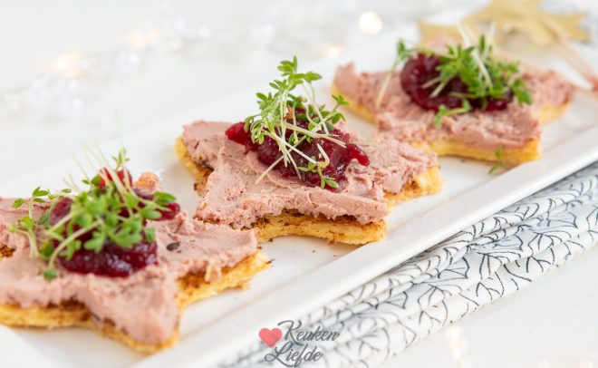 Beleg met cranberrysaus en tuinkers