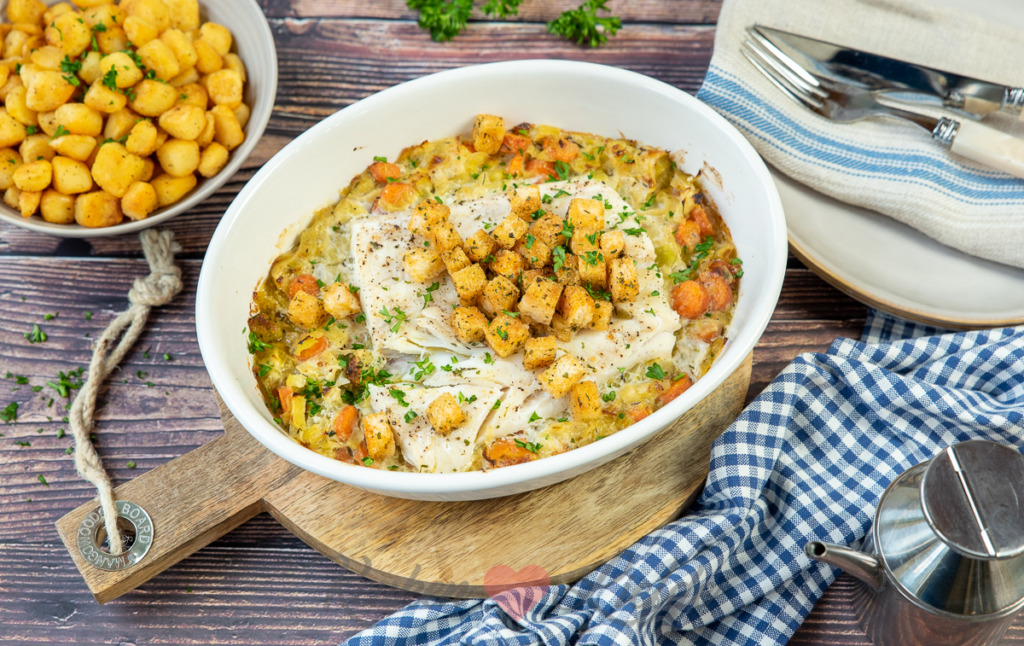 Kabeljauwschotel met romige wortel en prei