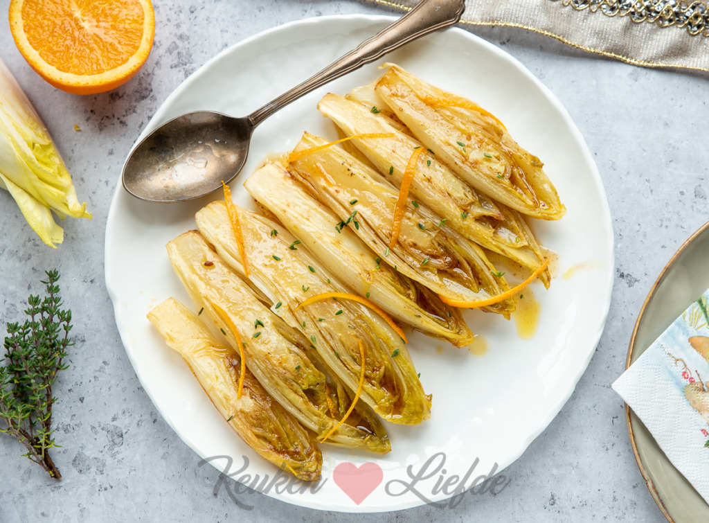 Gesmoorde witlof in sinaasappelsaus