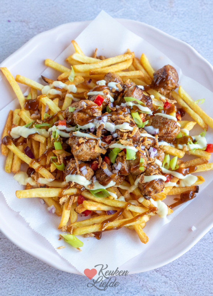 Loaded fries met curryworst Loaded fries met curryworst